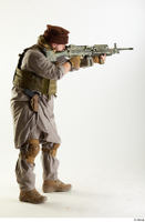  Photos Luis Donovan Army Taliban Gunner Poses aiming gun standing whole body 0006.jpg